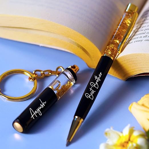 Gold Flake Pen (Jari Pen) with customization option, paired with a stylish keychain — a perfect premium gifting choice under ₹1000